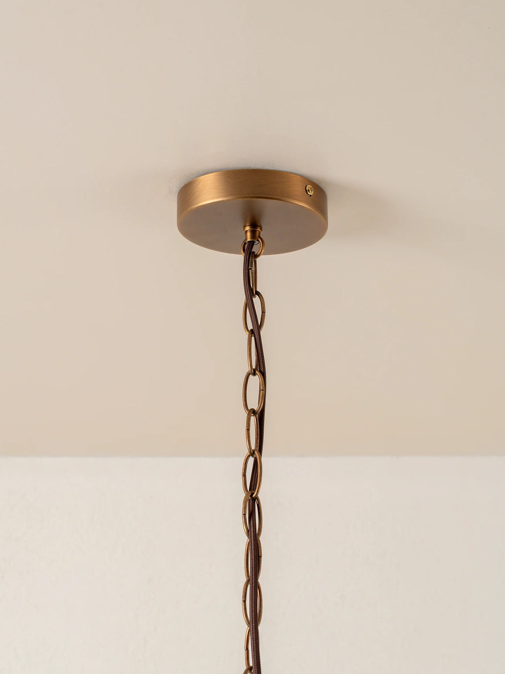 Lonso - 4 light aged brass and smoked brown glass chandelier
