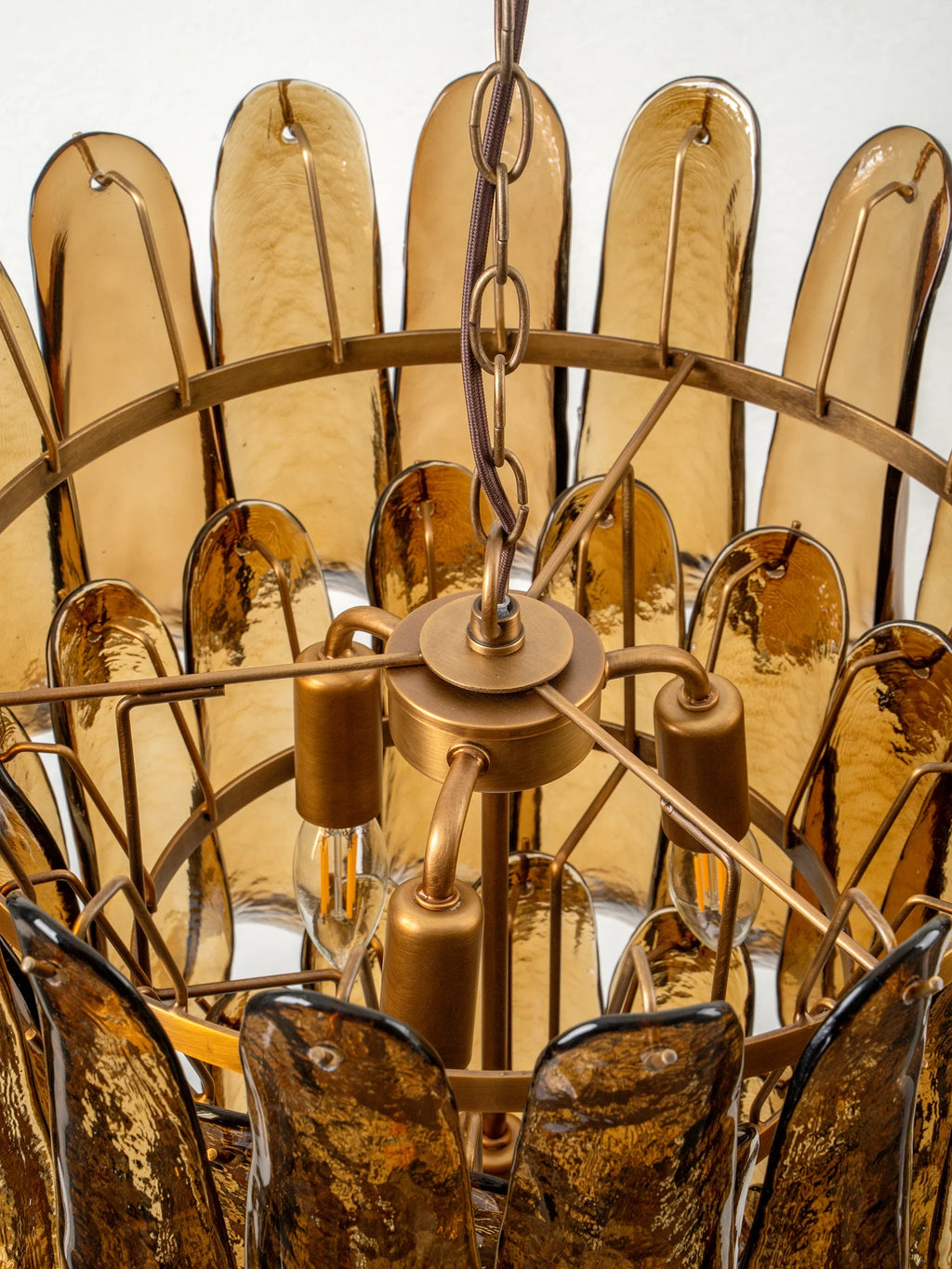Lonso - 4 light aged brass and smoked brown glass chandelier