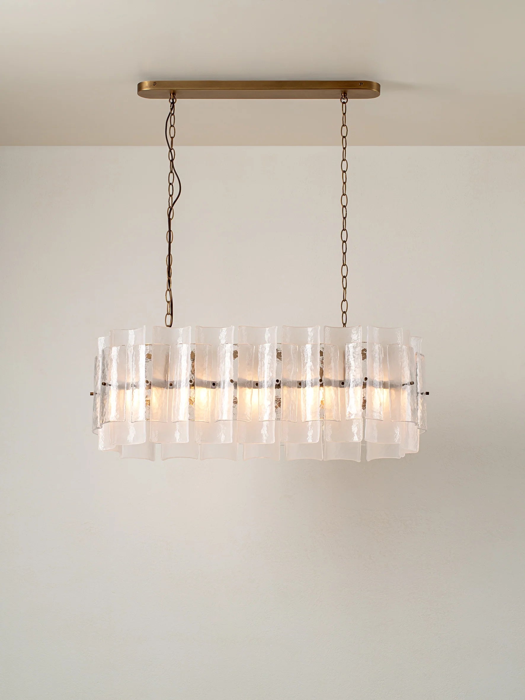Pazo - 9 light layered textured glass oval chandelier