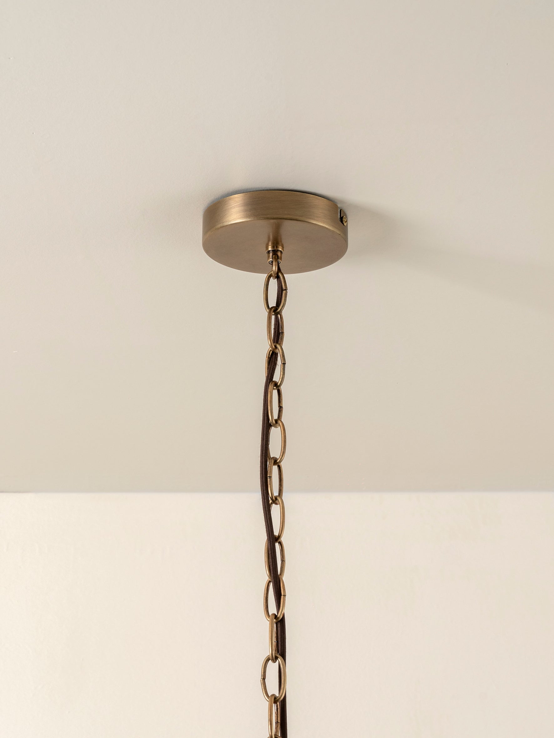 Waverly - 6 light aged brass and white porcelain pendant